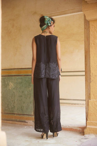 Back look of the top and bottom trouser. It also display floral cutwork embroidery.