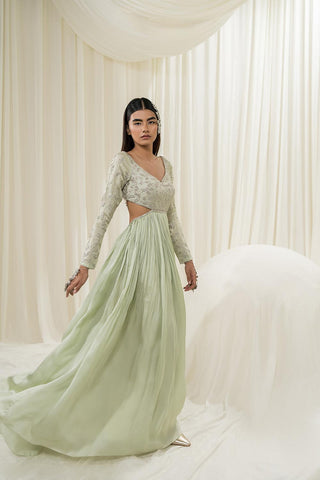 Light mint anarkali dress designed by Ease. A perfect dress for cocktail party or sangeet ceremony.