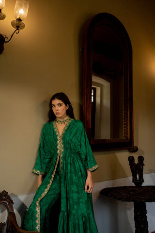 A Kaftan set relaxed look with front slit drop sleeves, front slit and pant look. Perfect outfit for cocktail parties, wedding ceremony celebrations.