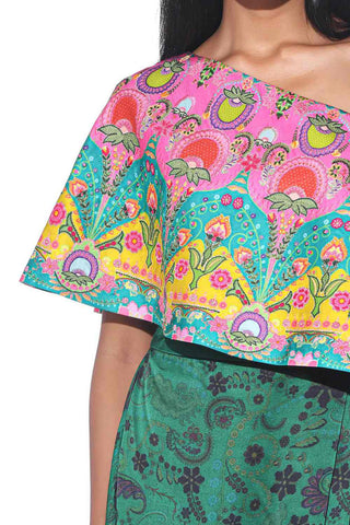 Boho chic and graceful Pink and teal One-Shoulder colorful printed Top with Green Printed Drape Skirt, designed for effortless elegance. Indo-western fusion wear for cocktail parties, lounge, resort wear for women.