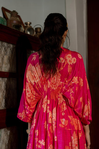 Close up look of Kaftan's back elastic gathers to accentuate the waist