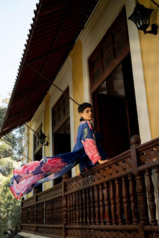 Palumi and Harsh model Showcasing blue floral print crepe jacket in style. 