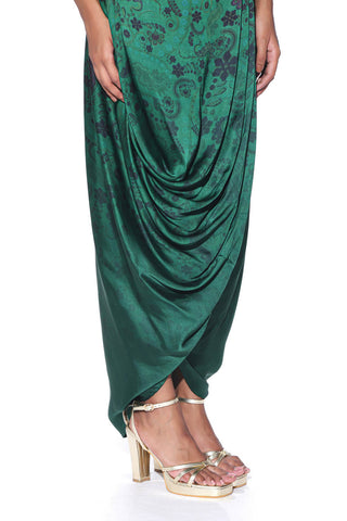 Green printed drape skirt blending elegance and contemporary flair for statement ethnic look.