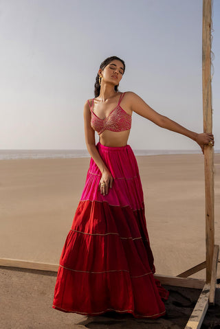 Ease model posing in ghagara set giving the close look of thin strap blouse and ghagara. A indian designer ghagara also called lahenga is perfect for sangeet or Navaratri occasion.