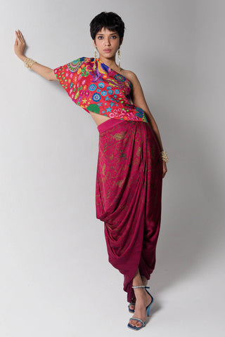 Chic and graceful Crimson Red One-Shoulder colorful printed Top with Maroon Printed Drape Skirt, designed for effortless elegance. Designed by Siddharth Bansal.