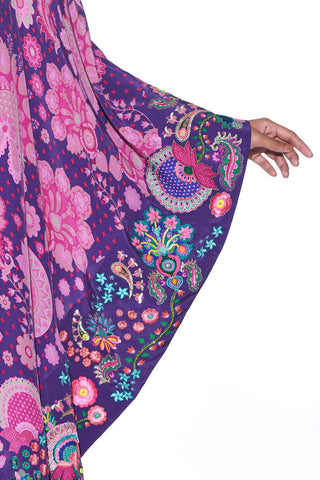 the close up look of the ethnic pasley design and free sleeves